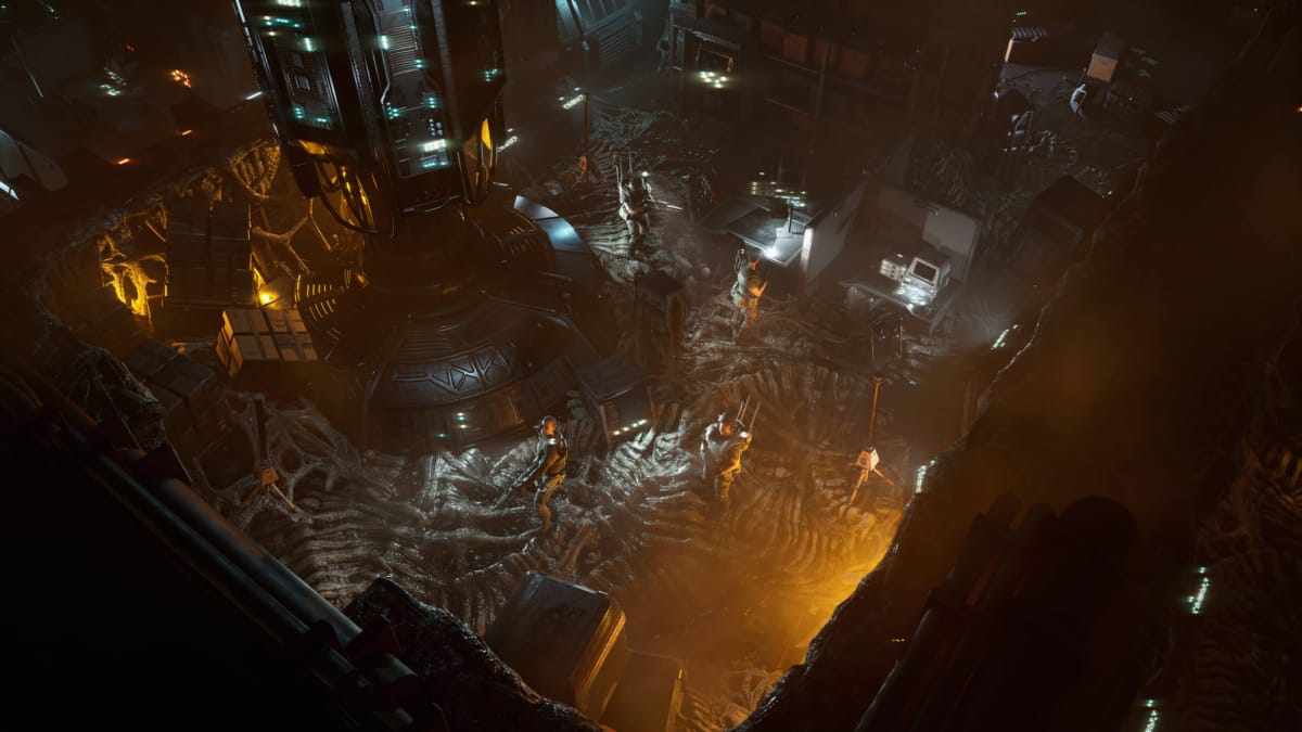 Several squad members standing around in a distinctly Alien-themed location in Aliens: Dark Descent