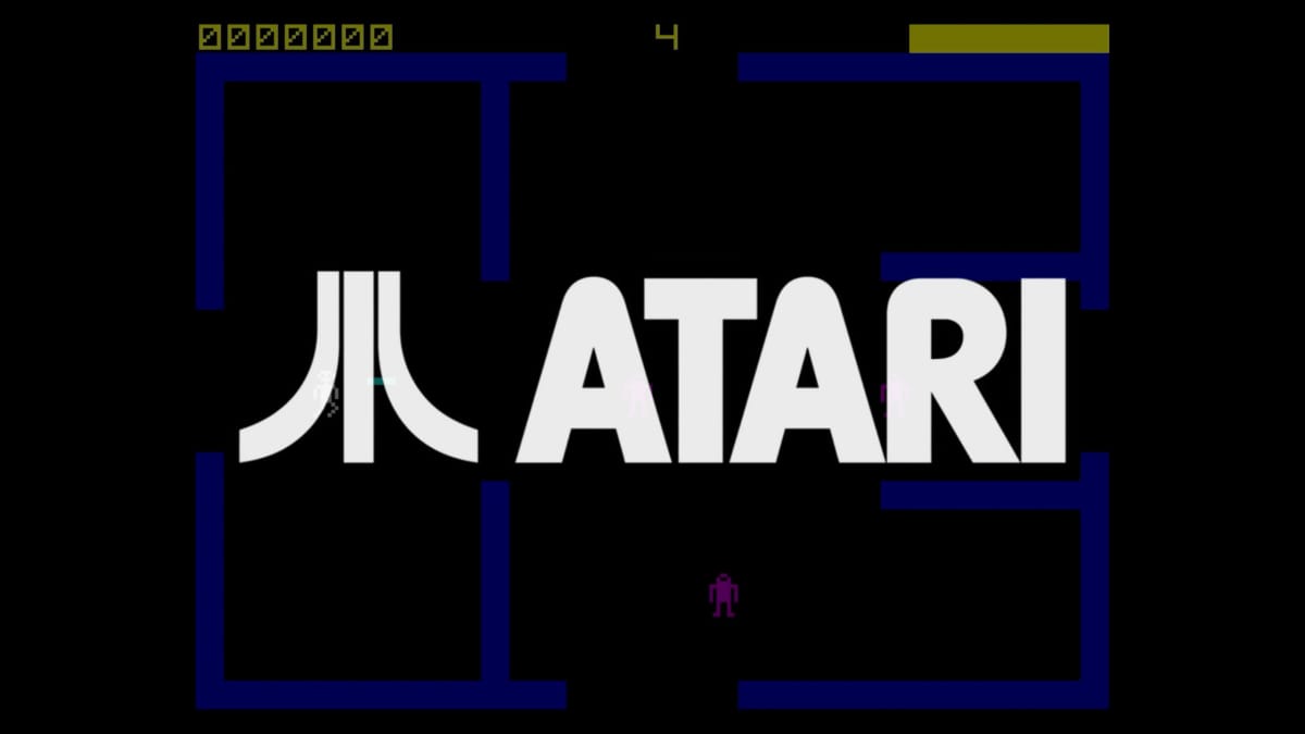 The Atari logo overlaid on a screenshot of the arcade game Frenzy