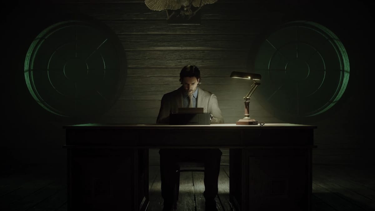 Alan Wake feverishly typing on a typewriter in Alan Wake 2