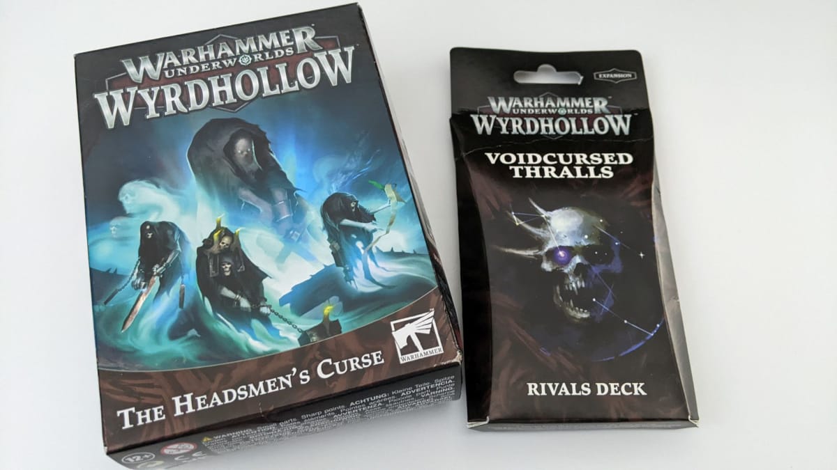 The boxes for Warhammer Underworlds The Headsman's Curse and Voidcursed Thralls Rivals Deck