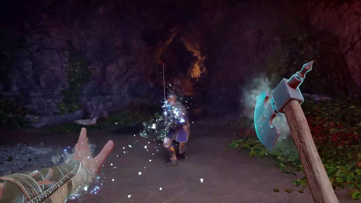 Avowed gameplay having the player using a hand axe and a cold spell, casting the latter at an enemy