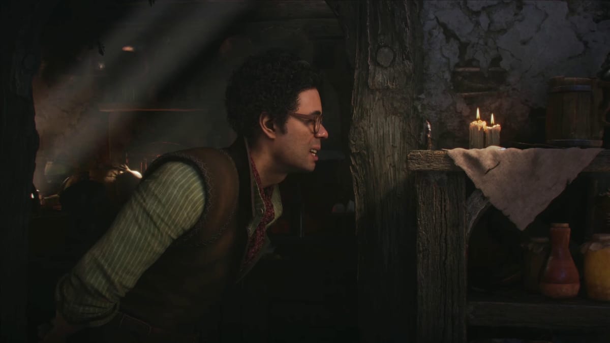 Richard Ayoade in the new Fable trailer, looking at a miniature hero