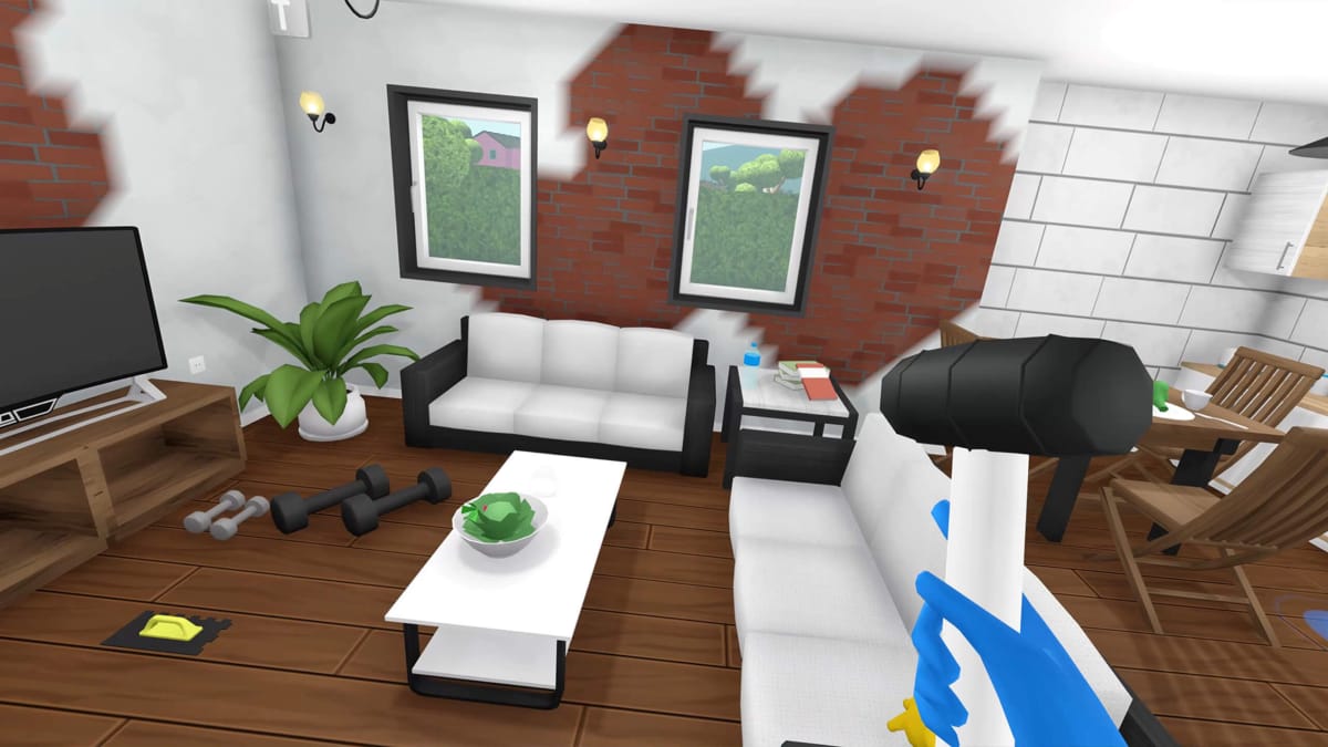 The player holding a hammer and looking at a work-in-progress room with splotches of paint in House Flipper VR