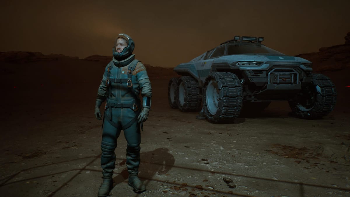 On the surface of Mars, Jack Leary stands next to a rover in Fort Solis 