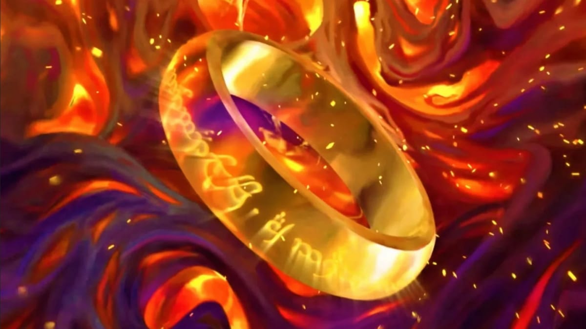 Card artwork showing The One Ring, with glowing letters on the outside, slowly sinking into molten lava.