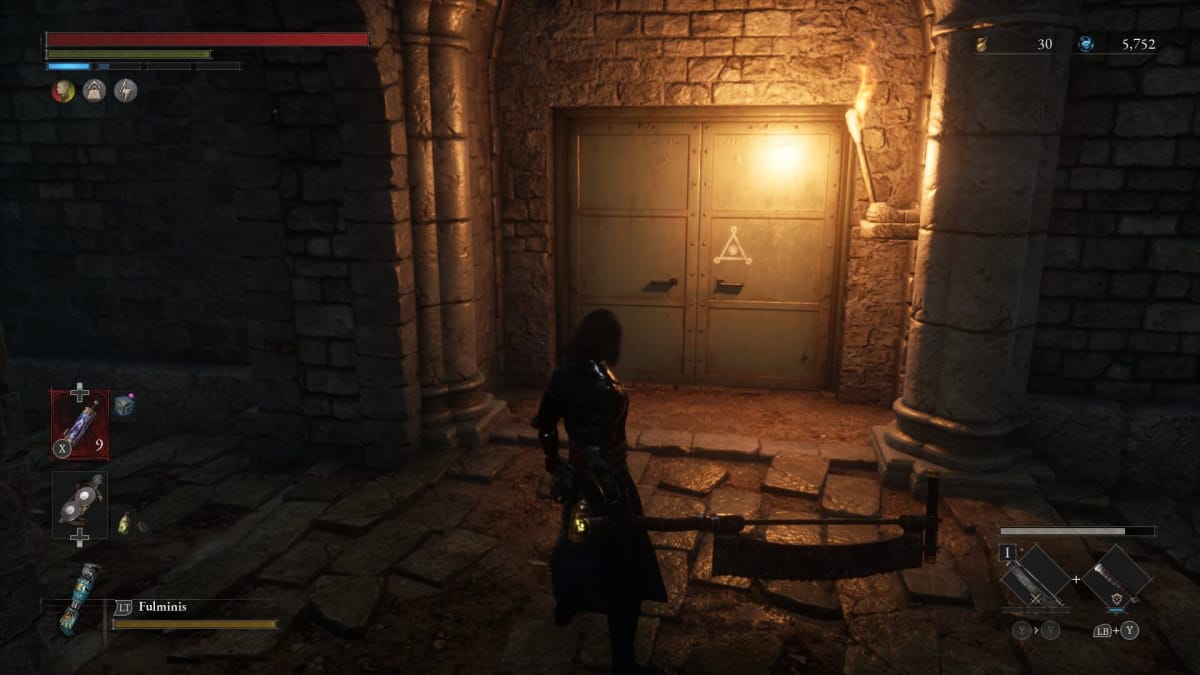 A Trinity Sanctum Door in a dimly lit ruin.