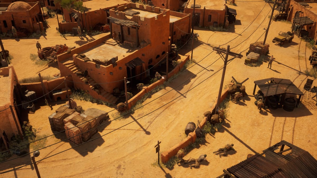 Soldiers shooting at each other from behind walls in a dusty desert town in Commandos: Origins