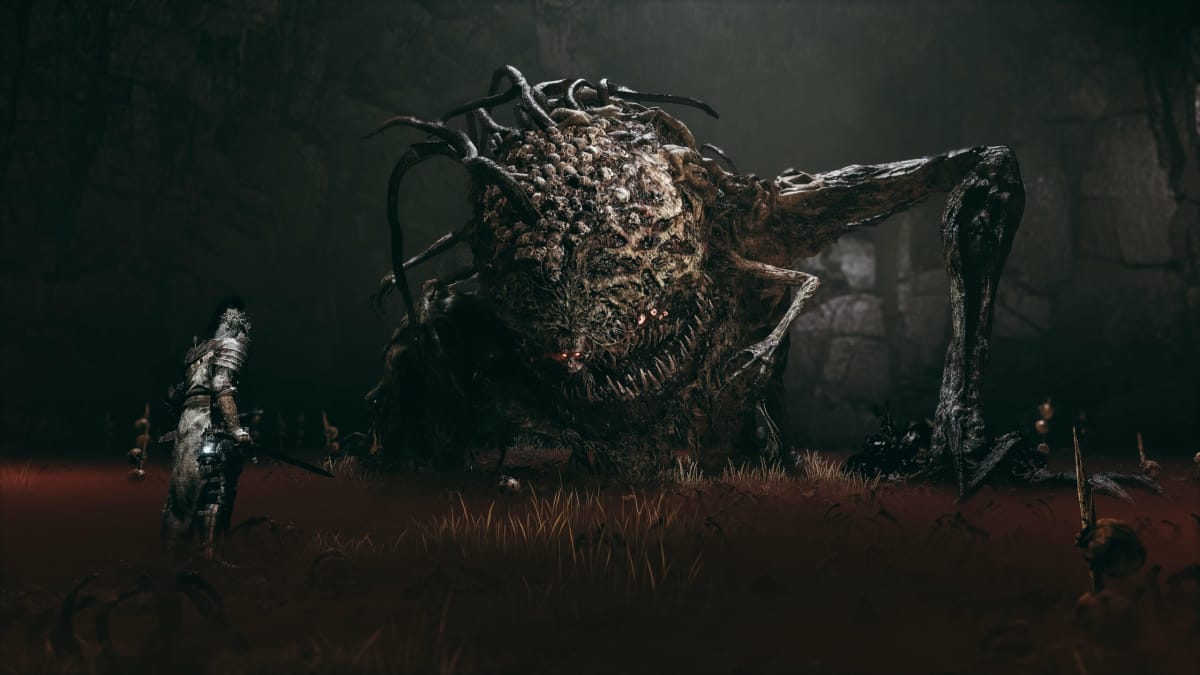 The massive Congregator of Flesh boss in his pit in Lords of the Fallen