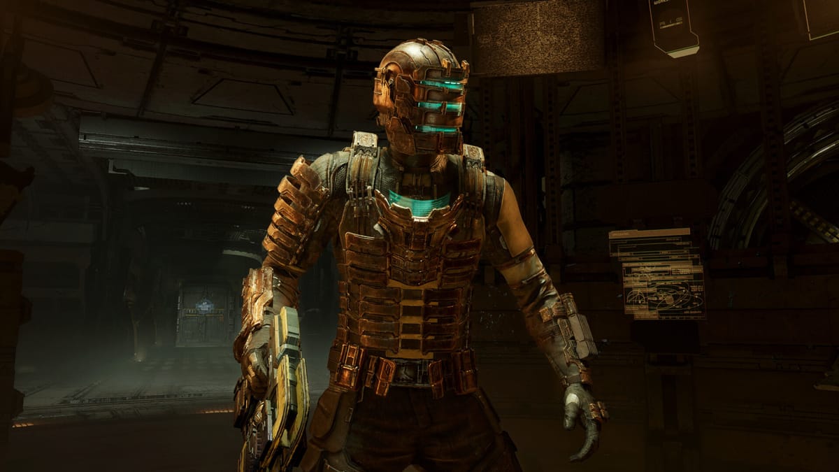 Isaac Clarke looking off into the middle distance in the dingy corridors of the USG Ishimura in the Dead Space remake, which is heading to Xbox Game Pass this month
