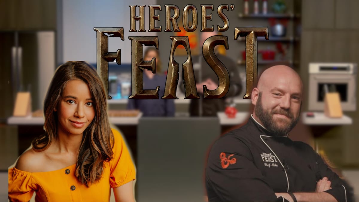 An image of the Heroes Feast set with the Heroes Feast logo and hosts Chef Mike and Sujata Day