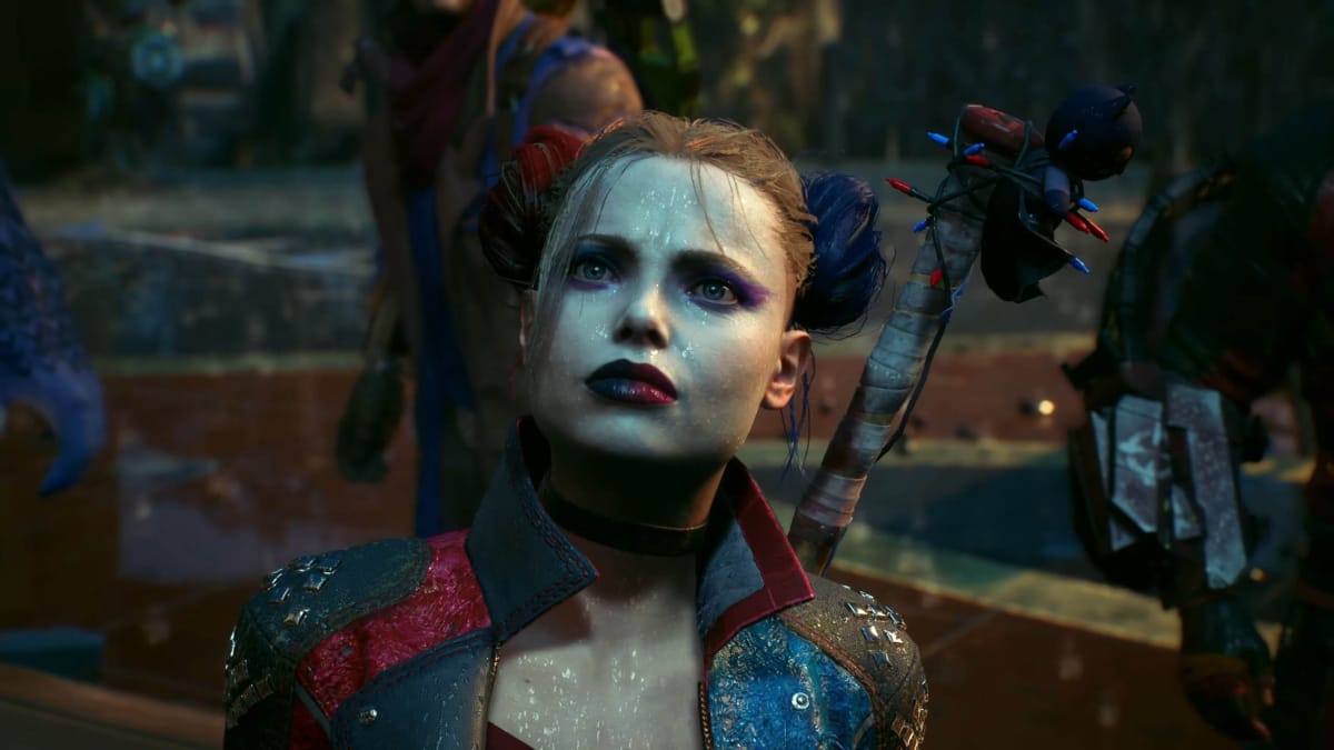 Harley Quinn looking concerned in the rain in Suicide Squad: Kill the Justice League