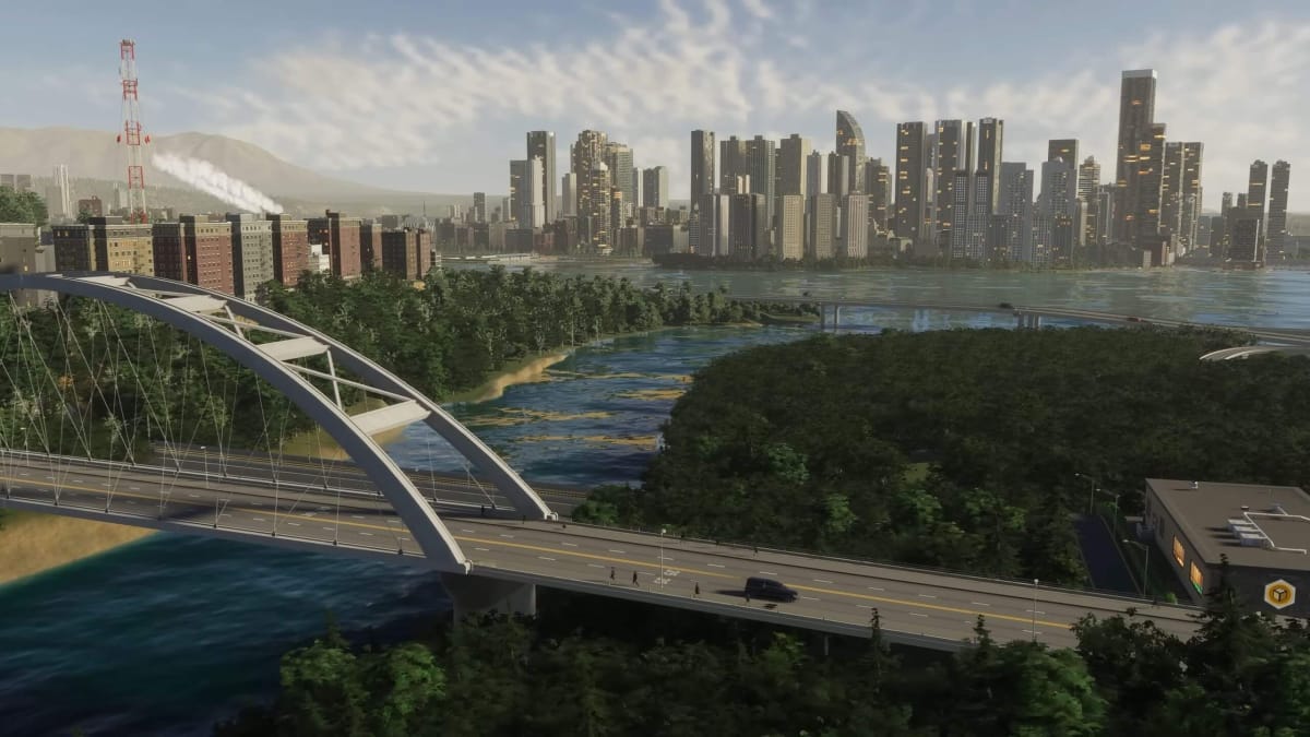 A side-on view of a city with a bridge in the foreground in Cities: Skylines 2