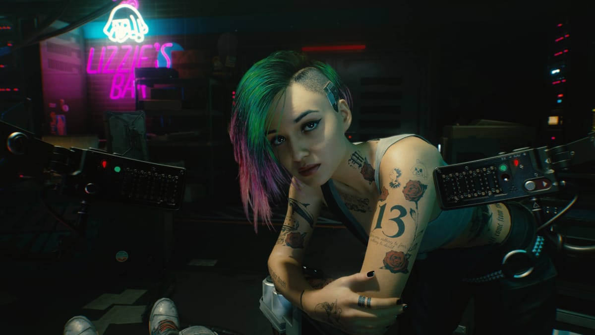 Judy Alvarez leaning on some equipment in Cyberpunk 2077, for which a followup codenamed Project Orion is currently in the works