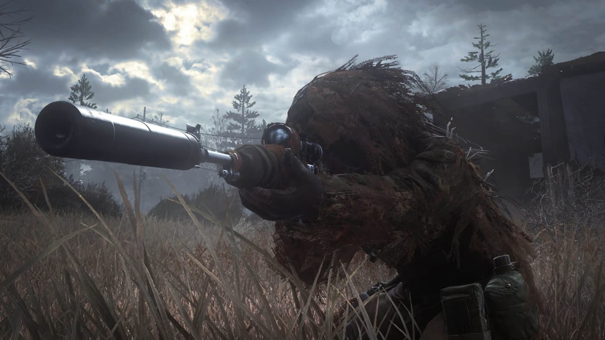 A character in a ghillie suit aiming a sniper rifle in Call of Duty: Modern Warfare Remastered