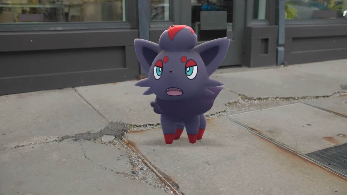 Zorua standing on a pavement in Pokemon Go