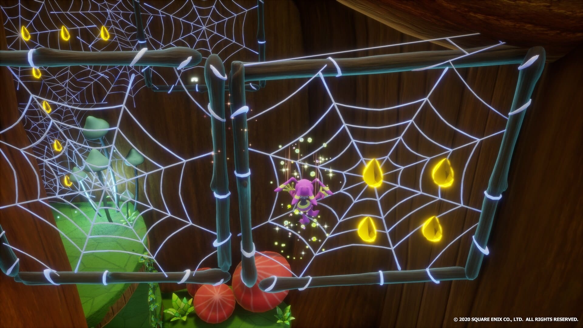 A character navigating spider's webs in Balan Wonderworld