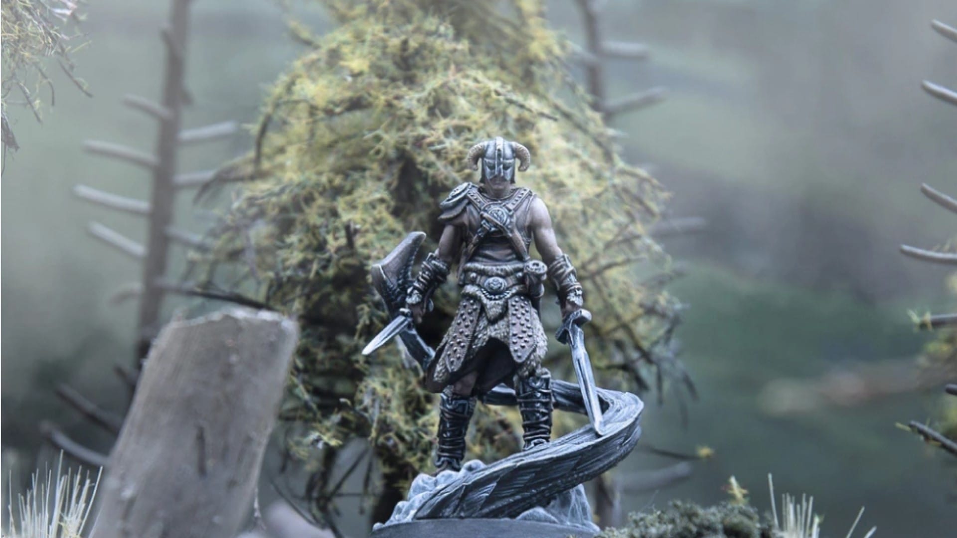 A figure of the Dragonborn in a forest as seen in The Elder Scrolls: Call to Arms