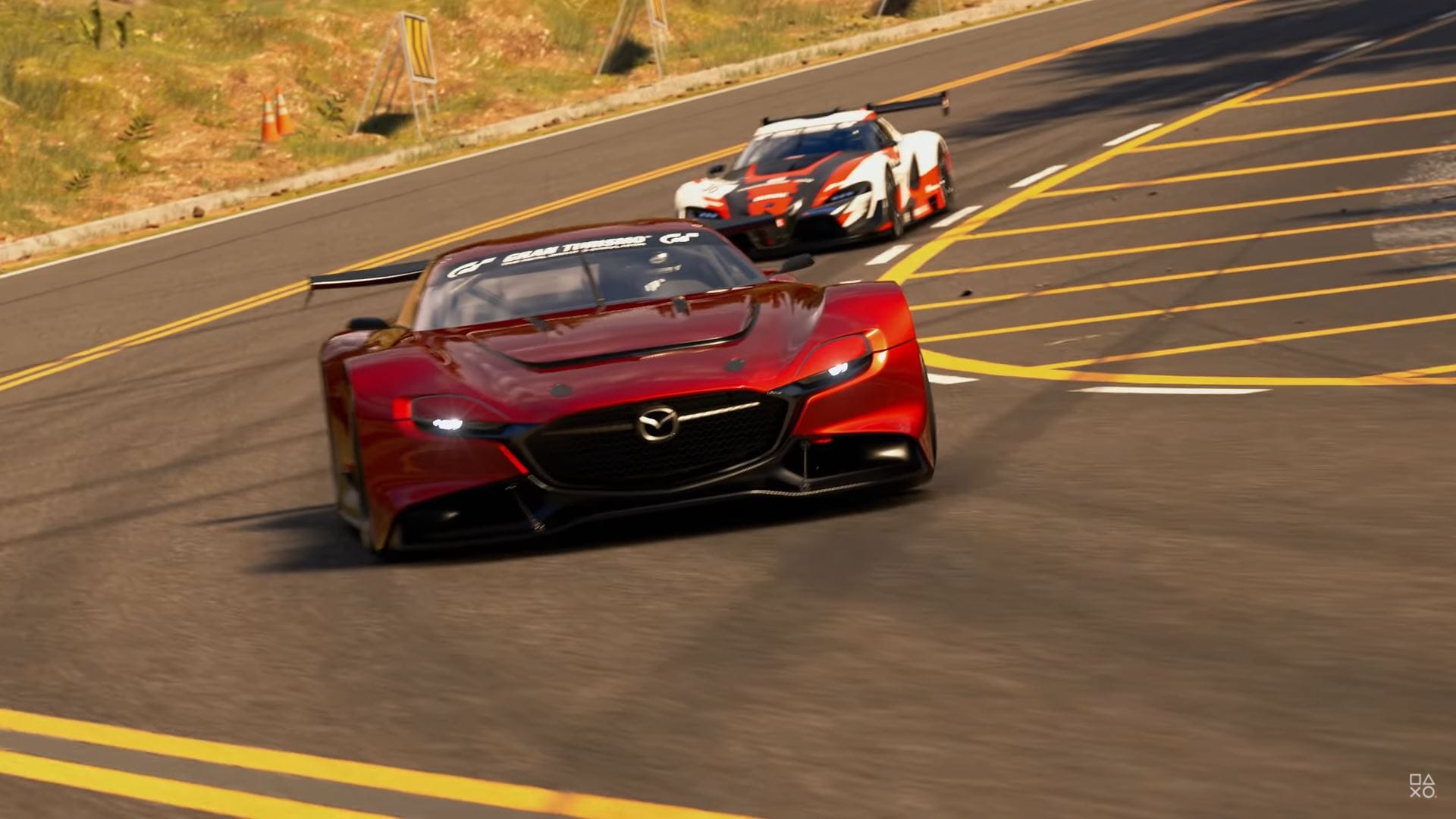 A car zooming around a track in Gran Turismo 7