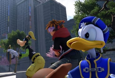 Donald, Sora, and Goofy can be seen in a street.
