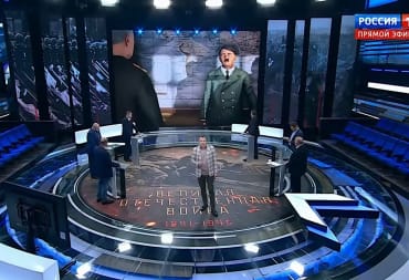 A Russian news channel discussing Strategic Mind: Blitzkrieg's alleged Nazi propaganda