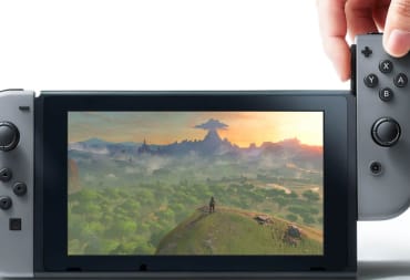 Someone removing or attaching a Joy-Con from or to the Nintendo Switch