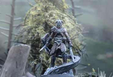 A figure of the Dragonborn in a forest as seen in The Elder Scrolls: Call to Arms