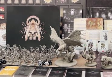 The box art, cards, and figures seen in the base version of Kingdom Death: Monster