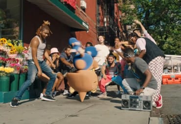 A breakdancing Hitmontop from the Pokemon 25 version of the Ten Cuidado music video.