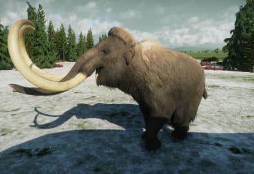 A mammoth trumpeting while standing in the snow in Prehistoric Kingdom