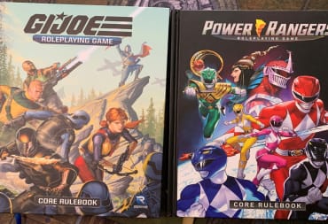 The GI Joe and Power Rangers Core Rulebook on a playmat