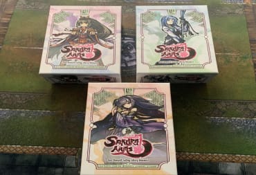 Three different Sakura Arms boxes on a gaming table