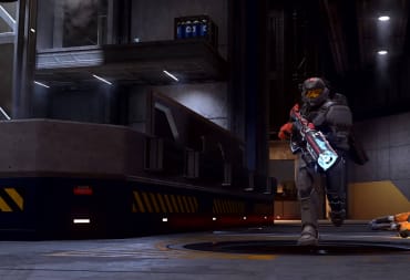 A 343 Industries Staff screenshot showing a Chief running toward the screen with a gun.