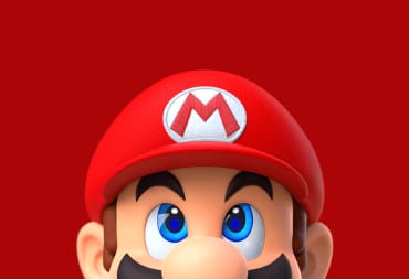 The top of Mario's head as he looks upwards against a red background