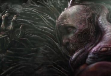 Scorn release date image showing off a guy lying down and generally not having a good day.