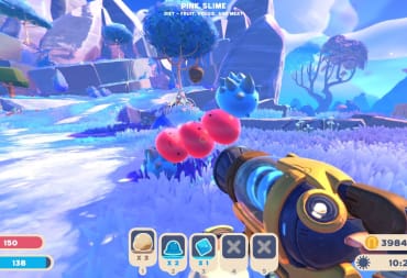 The player aiming at three red slimes and a blue spiky one in a colorful landscape in Slime Rancher 2