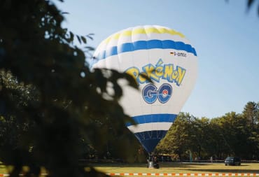 A huge hot-air balloon with the Pokemon Go logo on it
