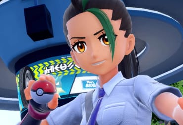 Nemona grinning and holding a Poke Ball in Pokemon Scarlet and Violet