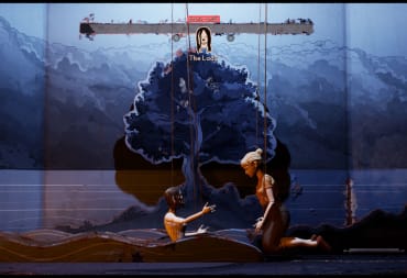 Martha Is Dead scene showing 2 puppets on a water-themed stage.