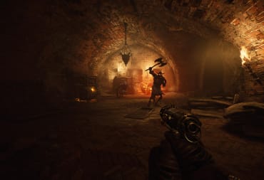 The player pointing their gun at enemies in a dingy dungeon in Witchfire