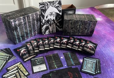 A photo of all the contents in Phyrexia All Will Be One Bundle: Compleat Edition