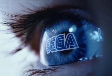 The Sega logo reflected in a person's eye