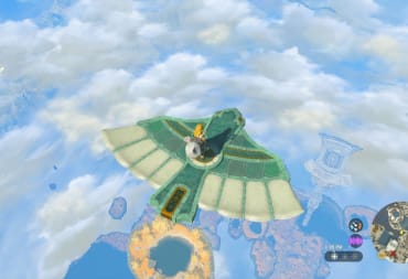 Link flying above the sky islands in Zelda: Tears of the Kingdom on a glider powered by a fan.