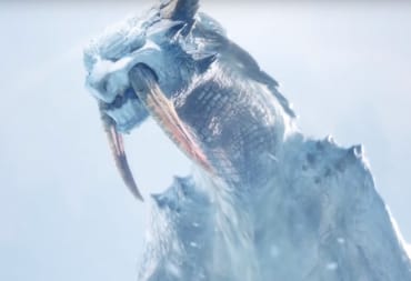 monster hunter world iceborne screenshot showing a giant saber-toothed creature with pale blue skin in an icey environment