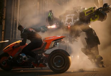 The player riding a motorbike and firing at a robotic enemy in Cyberpunk 2077: Phantom Liberty