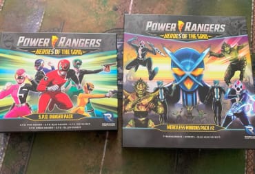 Box art for the Power Rangers SPD Ranger Pack and Merciless Minions 2 on a gaming mat.