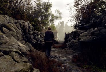 Leon walking down a forested path in Resident Evil 4