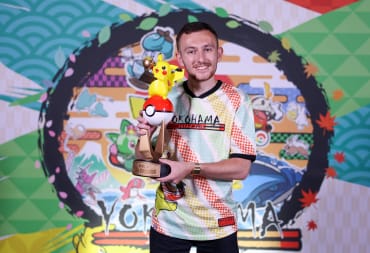Vance Kelley, one of the winners at the Pokemon World Championships 2023, holding a Pikachu trophy