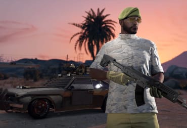 A man holding a rifle and standing in front of a heavy duty-looking military-style car in GTA Online, meant to represent Grand Theft Auto 6