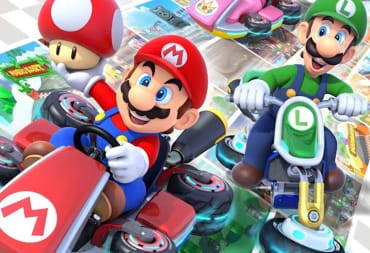 Mario holding a mushroom aloft and grinning with Luigi in the background in Mario Kart 8 Deluxe key art
