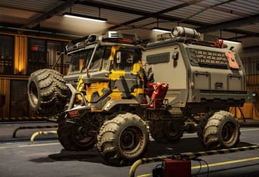 A heavy-duty truck sitting in a garage in Expeditions: A MudRunner Game